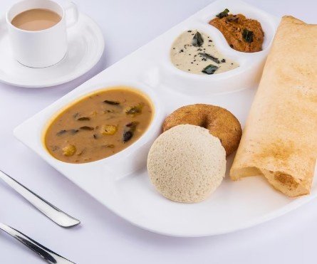 Best South Indian Breakfast in Anand Vihar with dosa, idli, vada, sambar, chutney, and coffee
